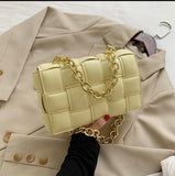 Stuck up quilted flap chain bag